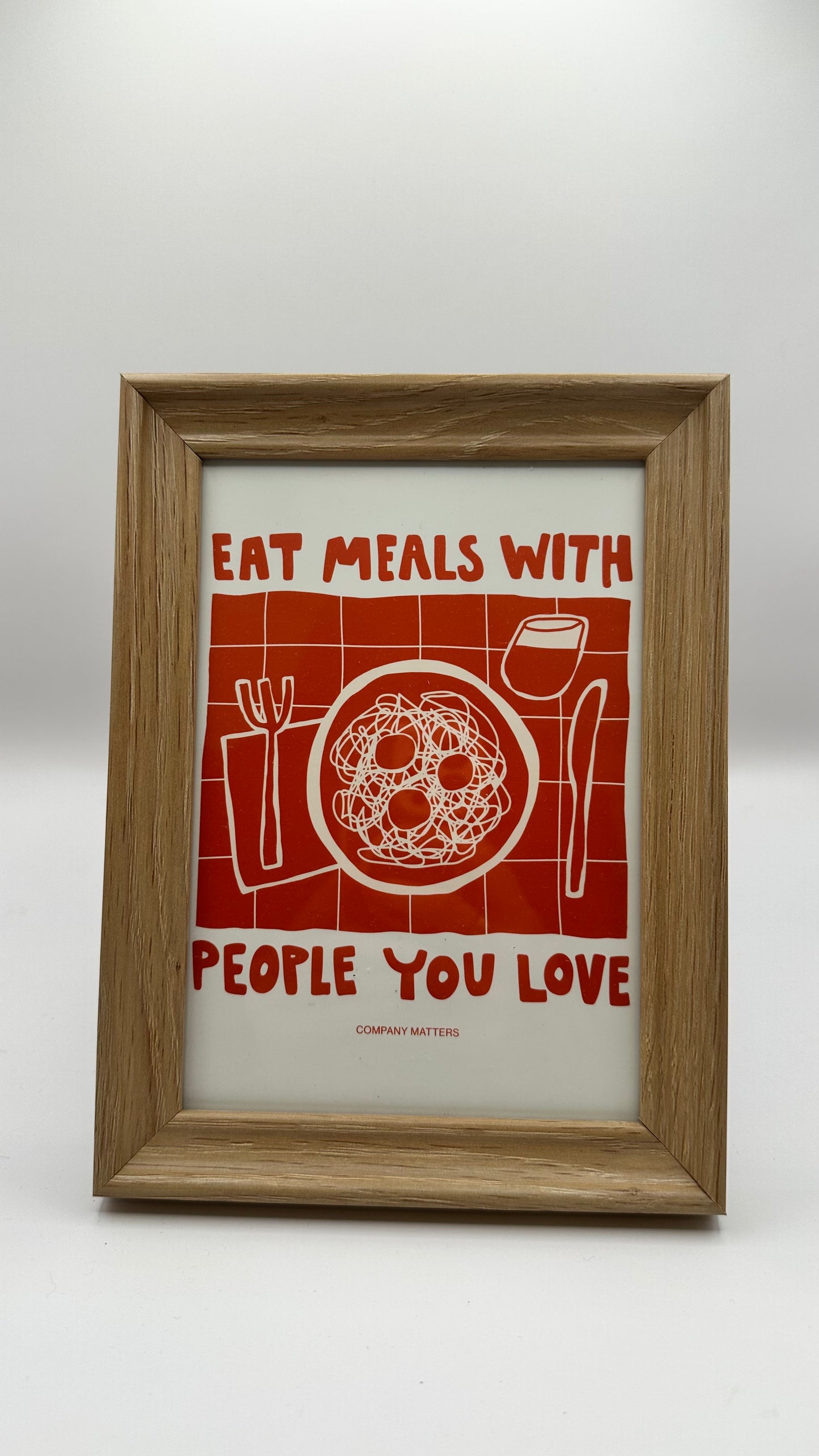 "Eat meals with people you love" Framed Postcard Print